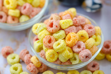 Cereal flakes in bowl with copy space,Breakfast concept.Food with delicious fruity taste and fruity colours.It's made with maize,wheat,and barley