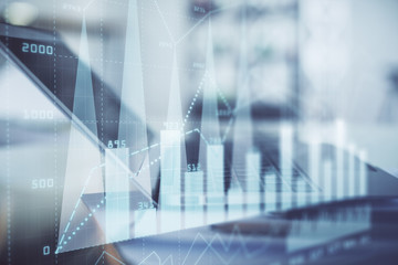 Forex graph hologram on table with computer background. Double exposure. Concept of financial markets.
