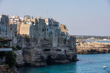 Fototapeta na wymiar View of Polignano a mare - picturesque little town on cliffs of the Adriatic Sea. Apulia, Southern Italy