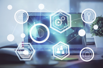 Computer on desktop with social network theme icon. Multi exposure. Concept of international connections.