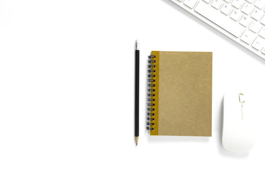 Office desk with copy space. Digital devices wireless keyboard and mouse on office table with note pad,you can apply to your product.