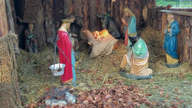 Christmas nativity scene represented with statuettes of Mary, Joseph, Jesus and magi