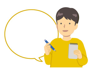 メモをとる黄色い服を着た男の子 