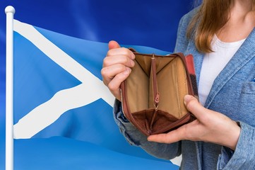 Poor person with empty wallet in Scotland