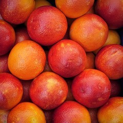 closeup of oranges on display at the market