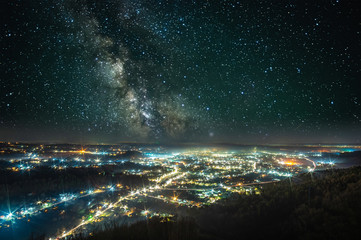 Starry sky over the night city