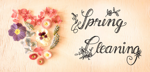Notalgic Wooden Background With English Calligraphy Spring Cleaning. Colorful Spring Flower Blossoms Heart