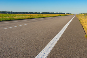 Morning landscape with empty high-way Dnipro-Kharkiv in central Ukraine