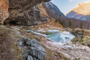 Winter. Ice games in the Fontanon of Goriuda waterfall. Friuli, Italy.
