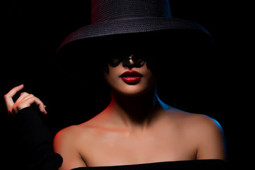 Young tanned skin Woman wear Hat Lace covers eyes with Red Lipstick Sexy Lips, Girl feels very hot lover and mysterious look in spot lighting black background. Collage group difference feeling