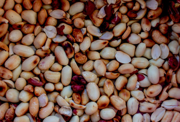 Roasted peanuts closeup. Peeled roasted peanuts, visas on top, for background