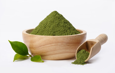 Matcha green tea powder in bowl with Organic green tea leaf isolated on white background, Organic...