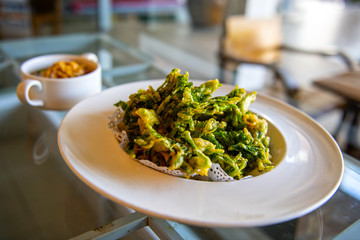 Morning Glory Fritters , eat with a sweet and sour sauce 