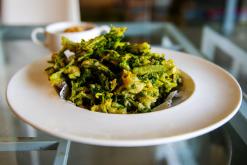 Morning Glory Fritters , eat with a sweet and sour sauce 