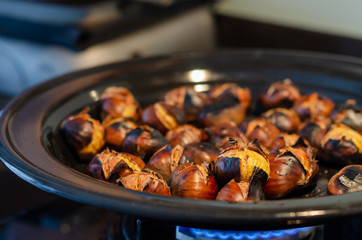 Roasting chestnuts on the pan