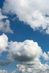 Naklejka na ściany i meble a beautiful blue sky day with white clouds as background.