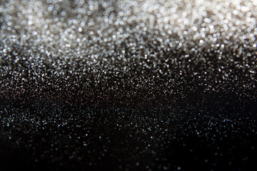 Glitter vintage lights background. Abstract blurred background.