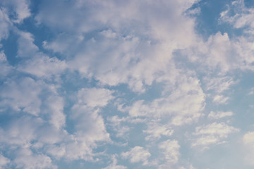 fluffy cloud above blue sky with sunlight in the morning