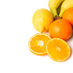 Group of tropical fruits, sliced halves of orange isolated on white background