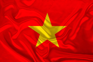 photo of the national flag of Vietnam on a luxurious texture of satin, silk with waves, folds and highlights, close-up, copy space, concept of state economy and politics, illustration