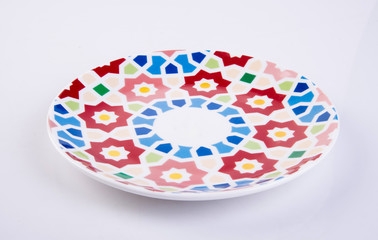 plate or hand painted plate on a background new.