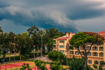 Sky before a thunder-storm. Huge thundercloud over the city.