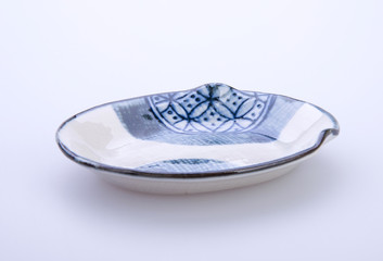 plate or hand painted plate on a background new.