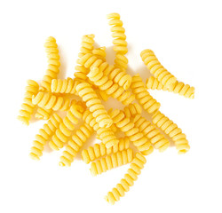 fusilli corti raw pasta isolated on white