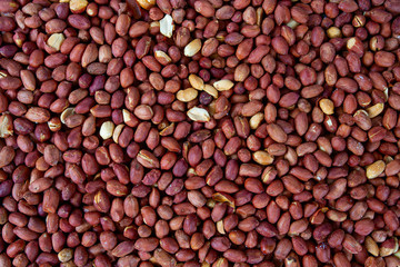 freshly roasted salted peanuts background