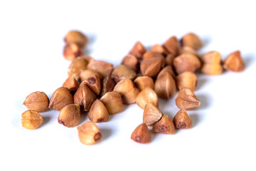 A bunch of buckwheat isolated on a white background.