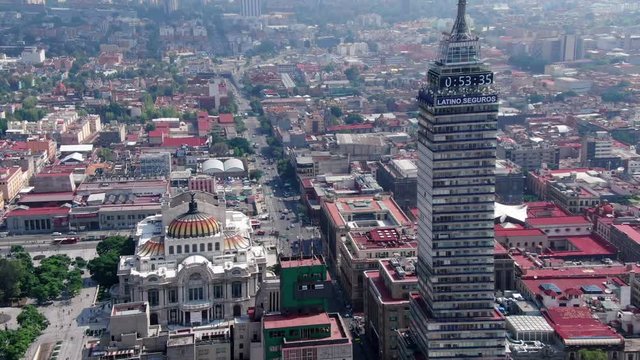 Aerial shot of a skyscraper and the the Palace of fine Arts in Mexico City