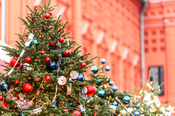 christmas-tree decoration bauble on decorated Christmas tree