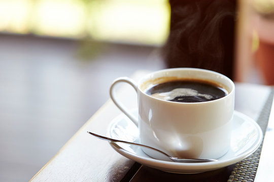 white cup of coffee