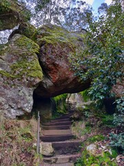 Stair case through the rock formation at Hanging Rocks Park, VIC, Australia.