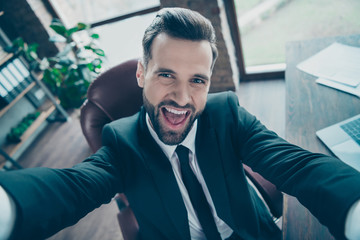 Closeyp photo of handsome business guy making taking funny selfies positive excited mood wear...