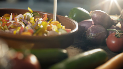 Woman preparing mixed vegetables in a bowl