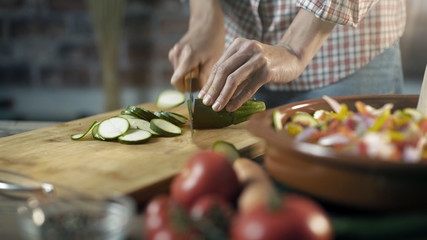 Woman preparing a healthy vegan meal at home