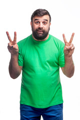 Fototapeta premium man with a beard on a white background shows emotions