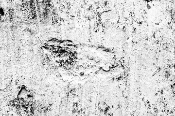 Texture of a concrete wall with cracks and scratches which can be used as a background