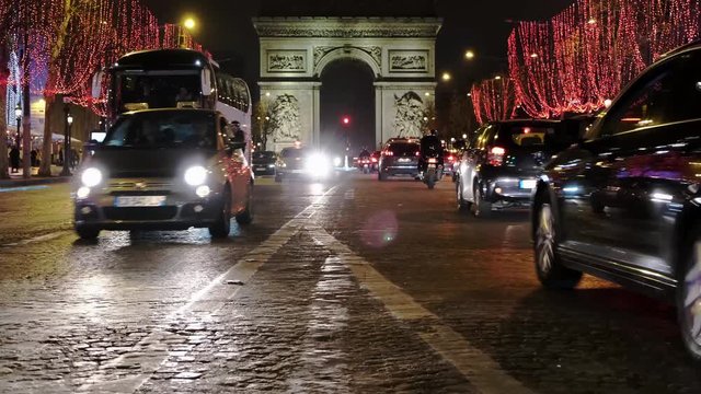 night footage of arc de triumph famous landmark in place de l&rsquo;&eacute;toile champs &eacute;lys&eacute;es paris France 50fps footage