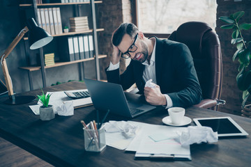 Photo of angry business guy look notebook table read awful wrong report blame stupid workers evil...
