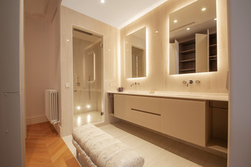 Fototapeta premium Luxurious Modern Bathroom interior design whith double sink, two mirrors and Tuffet.