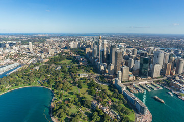 Fototapeta premium Aerial view of Sydney Royal Botanic Garden public garden and skyscrapers of CBD