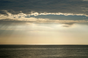 Nature seascape of Tranquil scene Light passing through the clouds on sunset over the ocean at phuket Thailand. Blue nature backdrop background with copy space text concept 