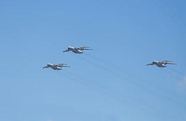 military transport plane and in the sky. MOSCOW, RUSSIA - MAY 9, 2018: Military transport aircraft IL-76 MD during the parade dedicated to Victory Day fly over Red Square. 