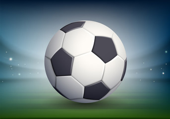 Fototapeta premium Soccer ball on the night field of the stadium