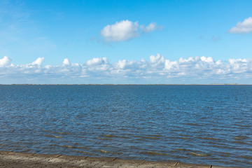 north sea in germany with water, waves and sky
