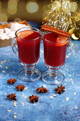 New Year Christmas two glasses of non-alcoholic mulled wine on a blue background