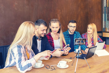 Young happy influencer friends vlogging live on social media network sharing marketing content on...