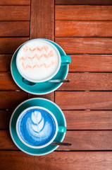 Latte art coffee and Matcha latte so delicious on white background